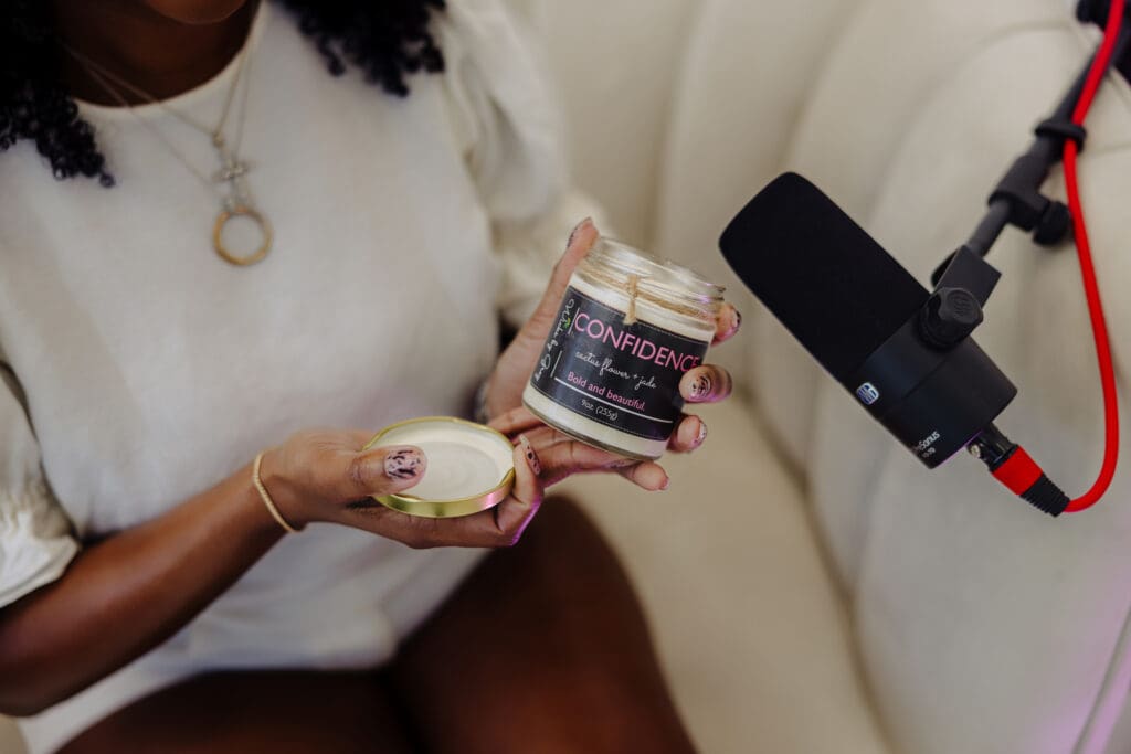 Confidence candle by Wicks by Grey, featured in Episode 3 of the Menopause Rebirth Podcast.