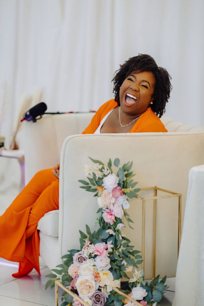 Chloe DaCosta laughing during her guest appearance on Episode 4 of the Menopause Rebirth Podcast.